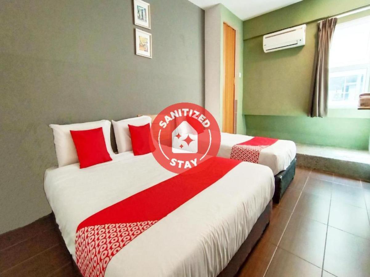 Super Oyo 89465 Golden Lounge Hotel Kuching Luaran gambar