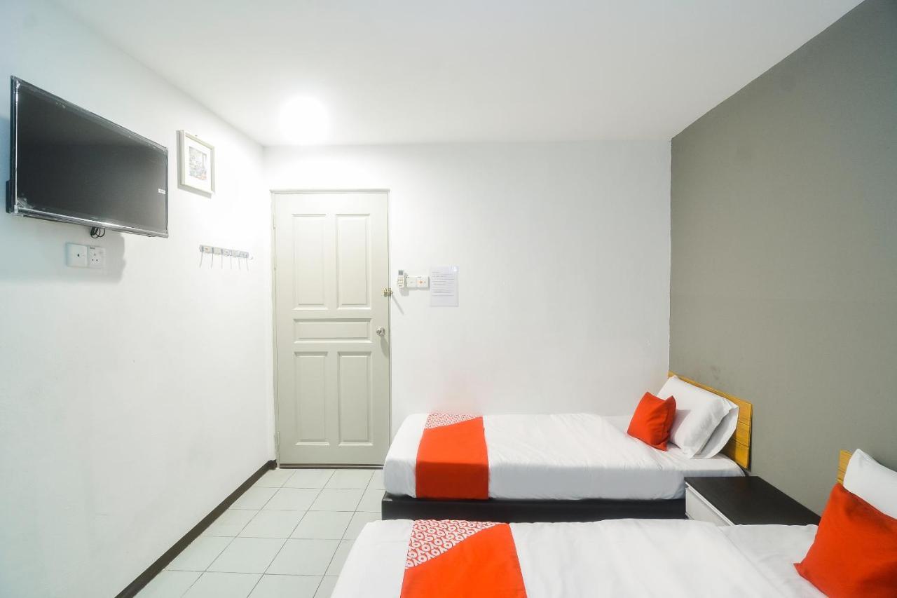 Super Oyo 89465 Golden Lounge Hotel Kuching Luaran gambar